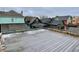 Spacious rooftop deck with city views and black railing at 114 N Oriental St, Indianapolis, IN 46202