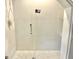 Clean shower with glass enclosure and tiled walls at 114 N Oriental St, Indianapolis, IN 46202