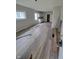 Living room with new wood-look flooring and gray walls at 1445 W 34Th St, Indianapolis, IN 46208