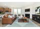 Bright living room with a cozy fireplace and ample natural light at 16970 Adler Ln, Noblesville, IN 46060