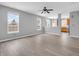 Open living room and kitchen with grey walls and laminate flooring at 2022 Calvert Cir, Greenwood, IN 46143