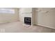 Gas fireplace with tiled hearth and shelves at 207 Stephen Ct, Carmel, IN 46280