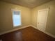 Bedroom with hardwood floors and a window with blinds at 2817 N New Jersey St, Indianapolis, IN 46205