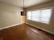 Dining room with hardwood floors and a window with blinds at 2817 N New Jersey St, Indianapolis, IN 46205