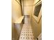 Laundry area with built-in shelving and linoleum floor at 2817 N New Jersey St, Indianapolis, IN 46205