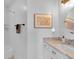 Bathroom with a marble countertop and classic black and white tile at 304 N College Ave # Apt A, Indianapolis, IN 46202