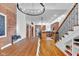 Bright kitchen with wooden dining table, stainless steel appliances, and open layout design at 304 N College Ave # Apt A, Indianapolis, IN 46202