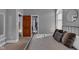 Bedroom featuring an open doorway that offers glimpses into connecting rooms and a window at 304 N College Ave # Apt B, Indianapolis, IN 46202