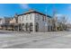 Exterior view of the building featuring architectural details, arched windows, and adjacent street at 304 N College Ave # Apt B, Indianapolis, IN 46202