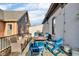 The inviting outdoor deck offers a gas firepit, grill, and ample seating for enjoying outdoor relaxation at 304 N College Ave # Apt B, Indianapolis, IN 46202