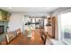 Dining room with hardwood floors and view into kitchen at 3699 Lisa Ln, Plainfield, IN 46168