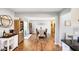 Bright dining room with hardwood floors and view of kitchen at 3699 Lisa Ln, Plainfield, IN 46168