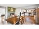 Dining area with hardwood floors and fireplace at 3699 Lisa Ln, Plainfield, IN 46168