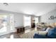 Spacious living room with vaulted ceiling and comfy furniture at 3699 Lisa Ln, Plainfield, IN 46168