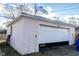 Detached single car garage with an automatic garage door opener at 4815 English Ave, Indianapolis, IN 46201