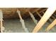 Attic with good insulation and wooden beams at 5340 Thompson Park Blvd, Indianapolis, IN 46237