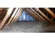 Spacious attic with good insulation and visible wooden framing at 5340 Thompson Park Blvd, Indianapolis, IN 46237