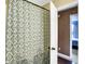 A shower with a patterned curtain and access to another room at 5340 Thompson Park Blvd, Indianapolis, IN 46237