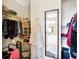 Walk-in closet with shelves, rods, and mirror at 5340 Thompson Park Blvd, Indianapolis, IN 46237
