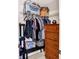 Closet with clothing, dresser, and shelving at 5340 Thompson Park Blvd, Indianapolis, IN 46237