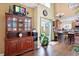Kitchen features island, hardwood floors, and view of backyard at 5340 Thompson Park Blvd, Indianapolis, IN 46237