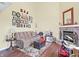 Living room with comfortable seating, fireplace, and hardwood floors at 5340 Thompson Park Blvd, Indianapolis, IN 46237