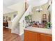 View of staircase leading to upper level, hardwood floors throughout at 5340 Thompson Park Blvd, Indianapolis, IN 46237