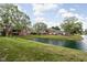 Community lake with green spaces at 611 Dellingham Dr # B, Indianapolis, IN 46260