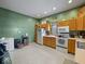 Functional kitchen with wooden cabinets and appliances, offering a practical cooking space at 619 Fair Ave, Shelbyville, IN 46176