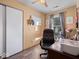 Bright office space featuring hardwood floors, a large desk, and a comfortable chair for a productive work environment at 619 Fair Ave, Shelbyville, IN 46176