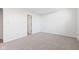 Simple bedroom with neutral carpeting and an adjacent bathroom at 626 Port Dr, Avon, IN 46123