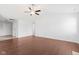 Living room with hardwood floors, vaulted ceiling, and ceiling fan at 626 Port Dr, Avon, IN 46123