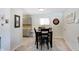 Charming dining area with a dark wood table and chairs at 7120 Lockwood Ln, Indianapolis, IN 46217