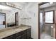 Elegant bathroom with granite countertop and walk-in shower at 7425 Cherryhill Dr, Indianapolis, IN 46254