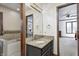 Bathroom features granite vanity and a soaking tub at 7425 Cherryhill Dr, Indianapolis, IN 46254