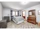 Charming bedroom with a full bed and ensuite bathroom at 7425 Cherryhill Dr, Indianapolis, IN 46254