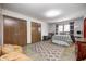 Cozy bedroom featuring a double bed, and hardwood floors at 7425 Cherryhill Dr, Indianapolis, IN 46254