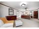 Spacious primary bedroom with large windows and hardwood floors at 7425 Cherryhill Dr, Indianapolis, IN 46254