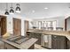 Granite countertops and stainless steel appliances highlight this kitchen at 7425 Cherryhill Dr, Indianapolis, IN 46254
