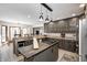 Updated kitchen featuring an island, gas cooktop, and ample cabinetry at 7425 Cherryhill Dr, Indianapolis, IN 46254