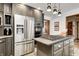 Modern kitchen with stainless steel appliances and dark gray cabinetry at 7425 Cherryhill Dr, Indianapolis, IN 46254