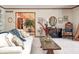 Bright living room with comfy sofas, wooden coffee table, and warm decor at 7425 Cherryhill Dr, Indianapolis, IN 46254
