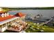 Lakeside marina with a large patio, offering a luxurious waterfront lifestyle at 7425 Cherryhill Dr, Indianapolis, IN 46254