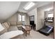 Cozy recreation room featuring a comfortable sectional sofa and home gym at 7425 Cherryhill Dr, Indianapolis, IN 46254