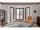 Cozy sitting area with bay windows and comfortable seating at 7425 Cherryhill Dr, Indianapolis, IN 46254