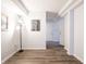 Finished basement with wood-look flooring and neutral decor at 7629 Farm View W Cir, Indianapolis, IN 46256