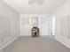 Bonus room with ample space, carpet flooring, and sound dampening features at 7629 Farm View W Cir, Indianapolis, IN 46256
