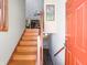 Bright foyer with hardwood stairs and stylish decor at 7629 Farm View W Cir, Indianapolis, IN 46256