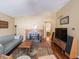 Inviting living room with hardwood floors, fireplace and modern furnishings at 7629 Farm View W Cir, Indianapolis, IN 46256