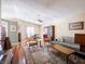 Spacious open-concept living room with hardwood floors and modern decor at 7629 Farm View W Cir, Indianapolis, IN 46256